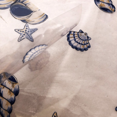 Transparent plasticized tablecloth with sea shell print h.130 cm